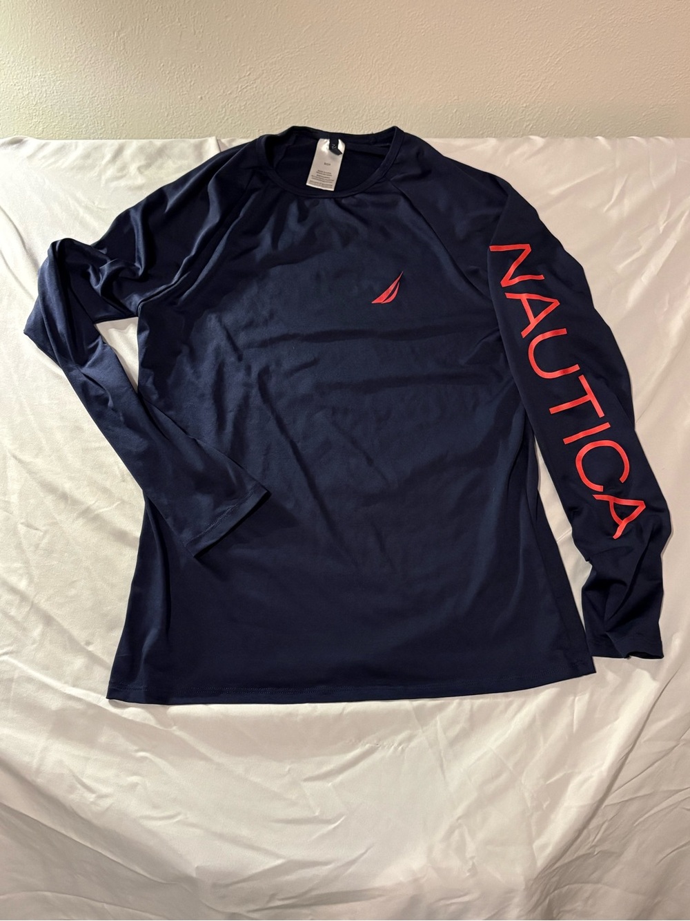 Nautica Menβs Navy Long-Sleeve Rash Guard with Red Logo Script